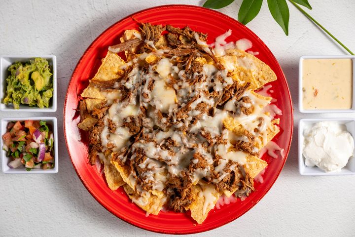 Moctezuma Mexican Grill signature dishes Aztec Nachos
Moctezuma Burrito
Quesadilla